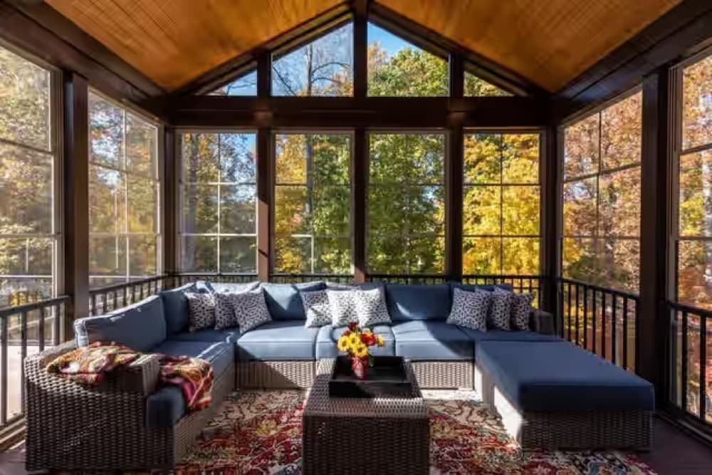Sunrooms — Transform your patio into a cozy, year-round sunlit haven.