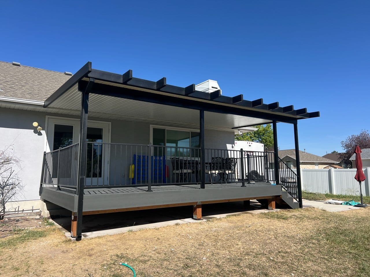 Elegant Trex Deck with Stylish Awning in South Jordan image