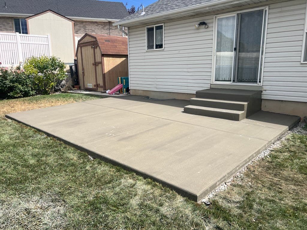 Backyard Concrete Patio Transformation in Pleasant Grove image